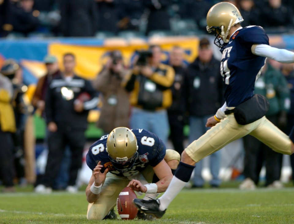 US Navy 041204-N-9693M-015 Navy kicks extra point during 105th Army Navy game