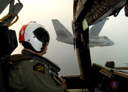 US Navy 041119-N-4374S-006 Lt. Jason Crain pilots a S-3B Viking in formation with other aircraft
