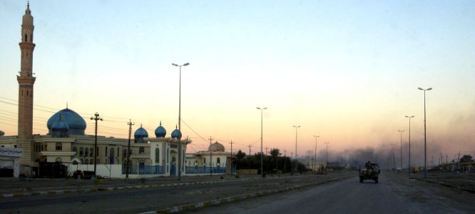 US Navy 041213-N-4614W-036 Smoke rises from sporadic fighting between U.S. Marines and insurgents inside the city of Fallujah, Iraq