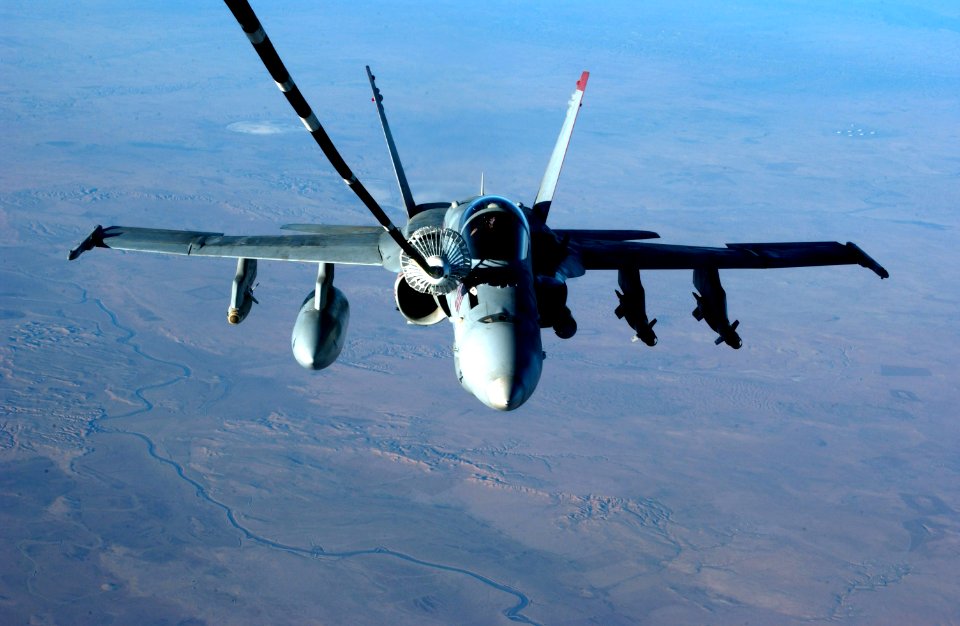 US Navy 041126-F-3188G-121 An F-A-18C Hornet assigned to the Bulls of Strike Fighter Squadron Three Seven (VFA-37), receives fuel from a U.S. Air Force KC-10 Extender assigned to the 908th Expeditionary Air Refueling Squadron