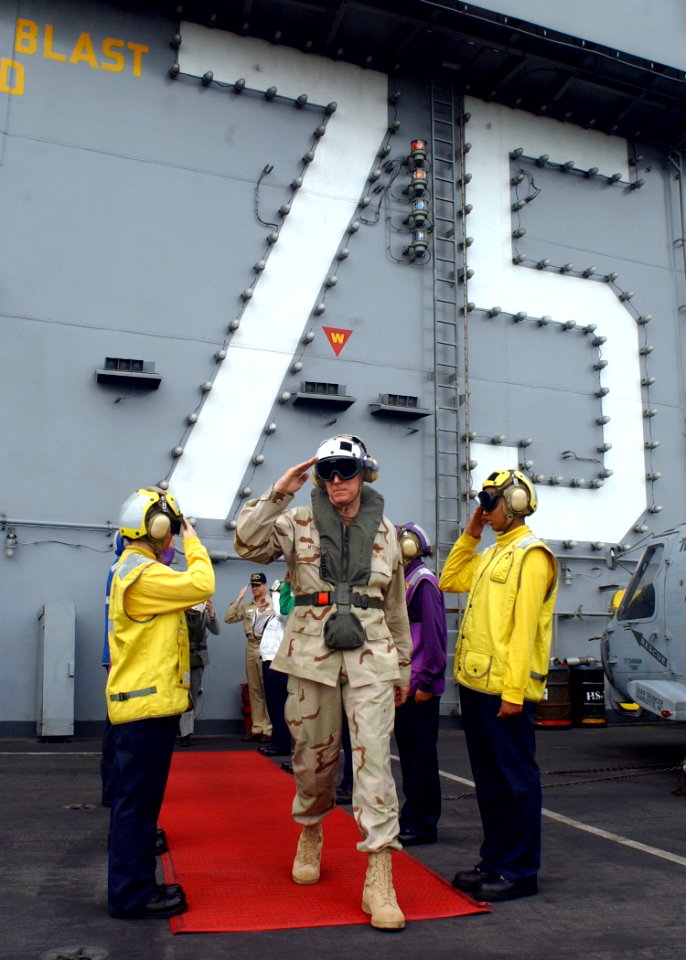 US Navy 041215-N-5345W-005 The Chairman of the Joint Chiefs of Staff Gen. Richard Myers, walks through rainbow side boys as he departs the Nimitz-class aircraft carrier USS Harry S. Truman (CVN 75)