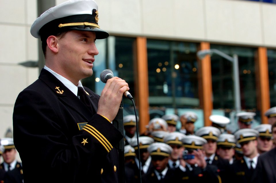 US Navy 041229-N-9693M-017 U.S. Naval Academy Midshipman 1st Class Aaron Polanco delivers remarks during a pep-rally in the San Francisco square