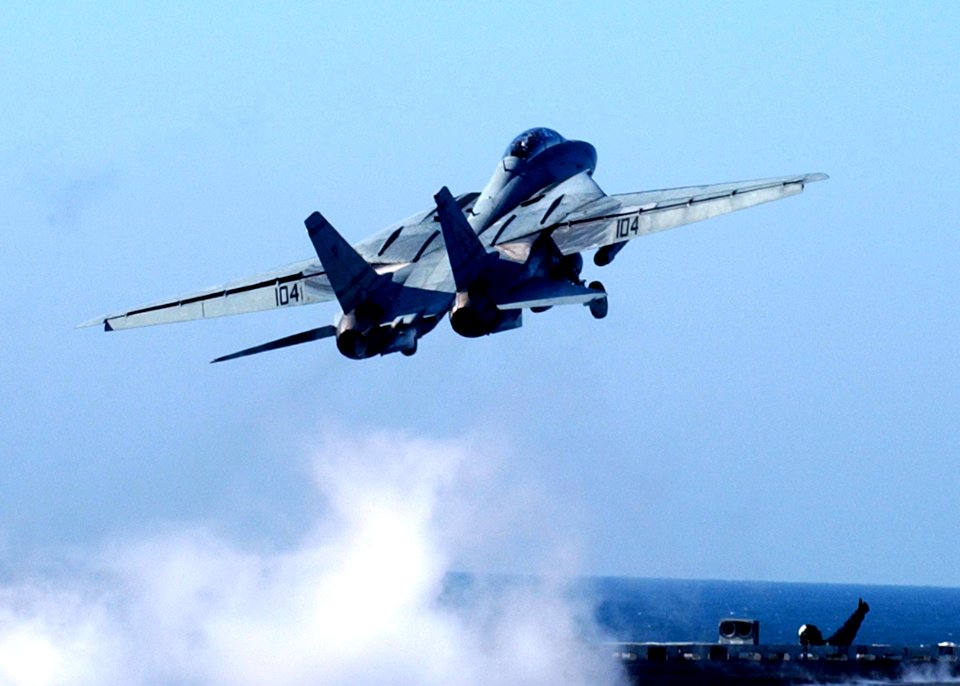 US Navy 041223-N-6363M-008 An F-14B Tomcat launches from the flight deck aboard the Nimitz-class aircraft carrier USS Harry S. Truman (CVN 75)