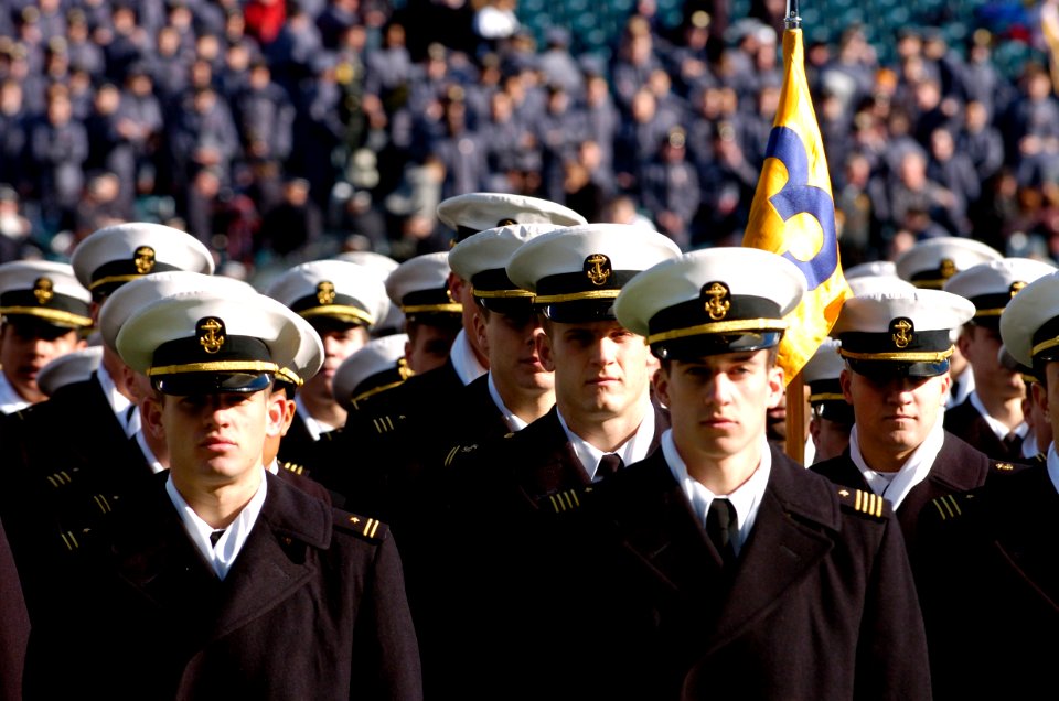 US Navy 041204-N-0295M-001 U.S. Naval Academy Midshipmen march onto Lincoln Financial field during pre-game ceremonies at the 105th playing of the Army vs. Navy game