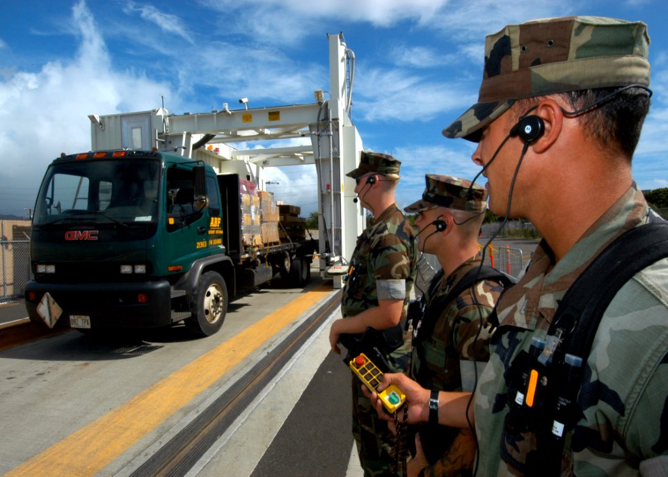 US Navy 041201-N-3019M-001 Master-at-Arms assigned to Naval Station Pearl Harbor Security prepare to clear the tunnel, making sure no residual radiation is present, after scanning a truck with the military's first fixed c