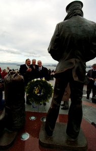 US Navy 041229-N-9693M-287 Secretary of the Navy (SECNAV), Gordon England, lays a wreath in honor of Sailors and Marines