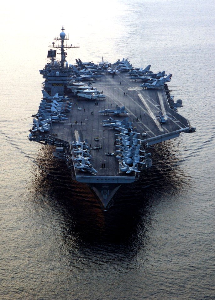 US Navy 041110-N-4374S-005 Sailors prepare for morning flight operations on the fight deck of the conventionally powered aircraft carrier USS John F. Kennedy (CV 67) in support of ground troops in Fallujah, Iraq under Operation