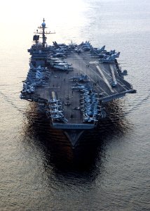 US Navy 041110-N-4374S-005 Sailors prepare for morning flight operations on the fight deck of the conventionally powered aircraft carrier USS John F. Kennedy (CV 67) in support of ground troops in Fallujah, Iraq under Operation
