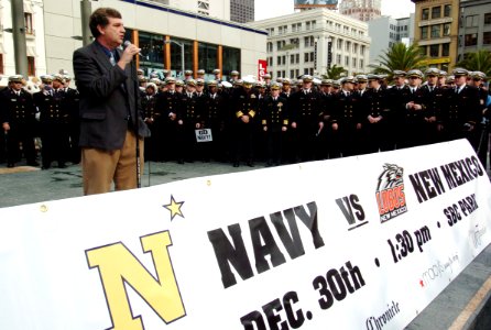 US Navy 041229-N-9693M-070 U.S. Naval Academy Head Football Coach Paul Johnson delivers remarks during a pep-rally in the San Francisco Union Square