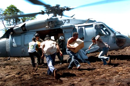 US Navy 050116-N-4142G-027 An MH-60S Knighthawk from Helicopter Combat Support Squadron Eleven (HC-11) delivers aid to areas of Indonesia