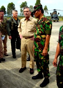 US Navy 050103-N-0057P-047 Commander, Carrier Strike Group Nine (CSG-9), Rear Adm. Doug Crowder, speaks with Indonesian Army Gen. Bambang about relief efforts in Aceh, Sumatra, Indonesia