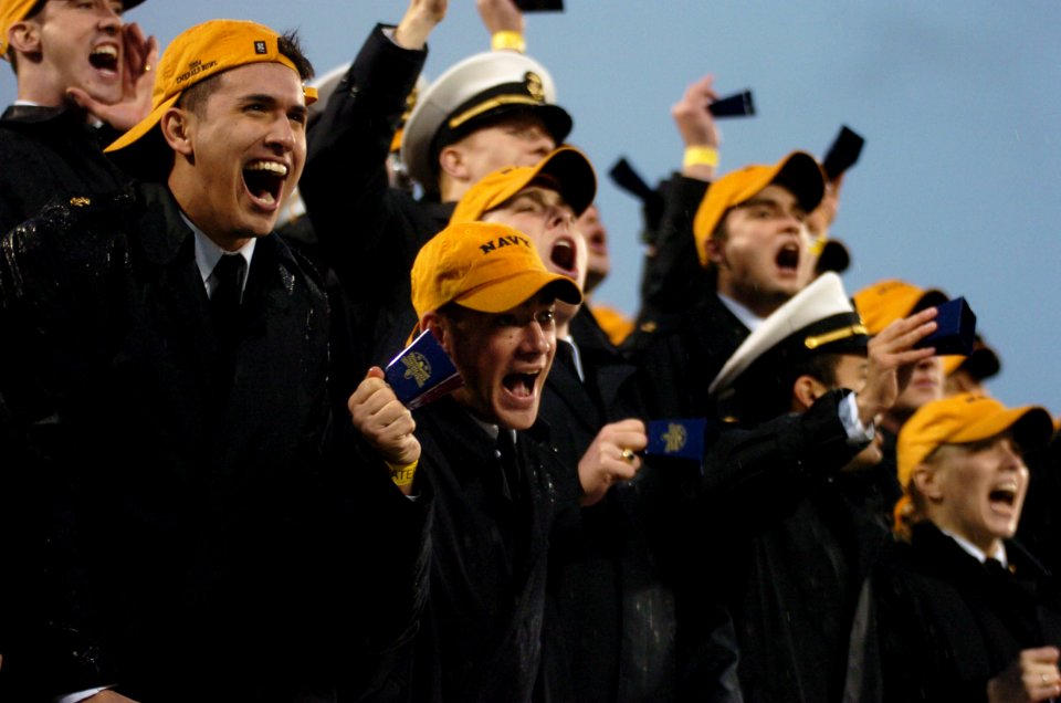 US Navy 041230-N-9693M-573 U.S. Naval Academy Midshipman in the stands cheer as the clock ticks down against the Lobos of New Mexico at the Emerald Bowl in San Francisco