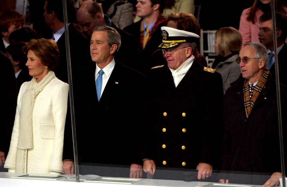 US Navy 050120-F-3231D-332 President George W. Bush, Chief of Naval Operations, Adm. Vern Clark and Secretary of the Navy, Gordon R. England, observe the pass and review during the 2005 Presidential Inaugural Parade held in Was