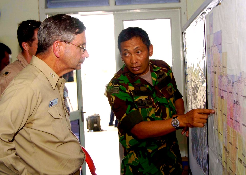 US Navy 050103-N-0057P-297 Commander, Carrier Strike Group Nine (CSG-9), Rear Adm. Doug Crowder, speaks with Indonesian Army Gen. Bambang about relief efforts in Aceh, Sumatra, Indonesia
