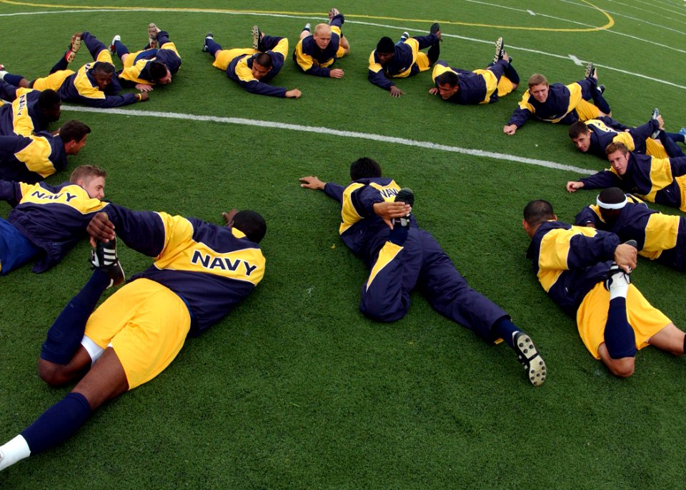 US Navy 050125-N-7615S-031 The U.S. Navy Soccer team warms up before the 2005 Armed Forces soccer tournament held at Naval Station San Diego, Calif photo