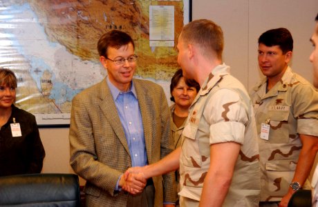 US Navy 041202-N-7469S-001 U.S. Senator James Talent (R-MO), greets a Sailor before a meeting with Missouri-state service members on board Naval Support Activity (NSA) Bahrain