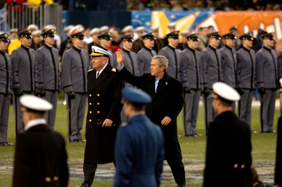 US Navy 041204-N-9693M-016 President Bush moves to the Navy side of the field during 105th Army Navy game