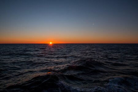 Sun dusk north sea photo