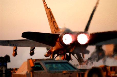US Navy 050113-N-6363M-029 An F-A-18A- Hornet launches from the flight deck aboard USS Harry S. Truman (CVN 75)