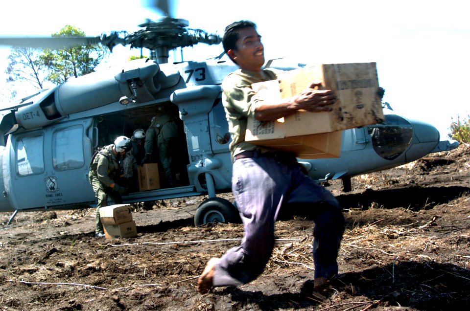 US Navy 050116-N-4142G-038 An MH-60S Knighthawk from Helicopter Combat Support Squadron Eleven (HC-11) delivers aid to areas of Indonesia