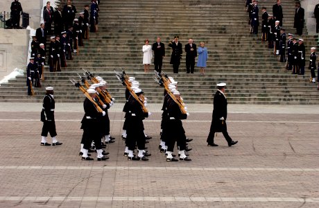 US Navy 050120-G-3024G-247 Sailors of the U.S. Navy Ceremonial Honor Guard pass in review at the East Front of the U.S. Capitol during the 2005 Presidential Inaugural held in Washington, D.C