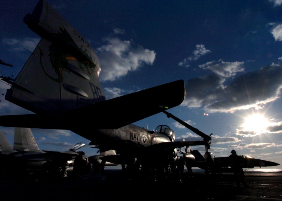 US Navy 041218-N-4308O-091 Sailors assigned to the Zappers of Electronic Attack Squadron One Three Zero (VAQ-130) perform maintenance on an EA-6B Prowler