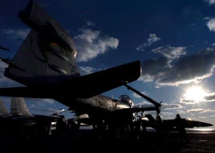 US Navy 041218-N-4308O-091 Sailors assigned to the Zappers of Electronic Attack Squadron One Three Zero (VAQ-130) perform maintenance on an EA-6B Prowler