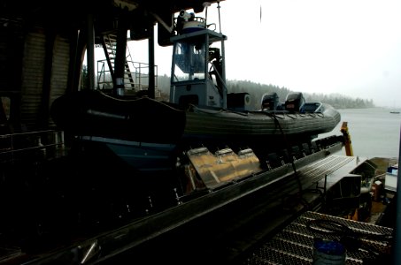 US Navy 050204-N-7676W-234 A Rigid Hull Inflatable Boat (RHIB) rests on a launch rail aft of the mission bay aboard the Navy's newest ship, the Littoral Surface Craft-Experimental (X-Craft), Sea Fighter (FSF 1) photo