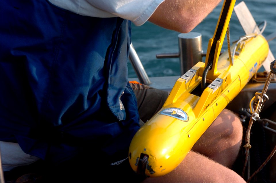 US Navy 050121-N-2653P-023 A member of the Navy Oceanographic Office International Survey Team, prepares to deploy a side-scan sonar device to bottom map the coastline near Banda Aceh on the island of Sumatra, Indonesia