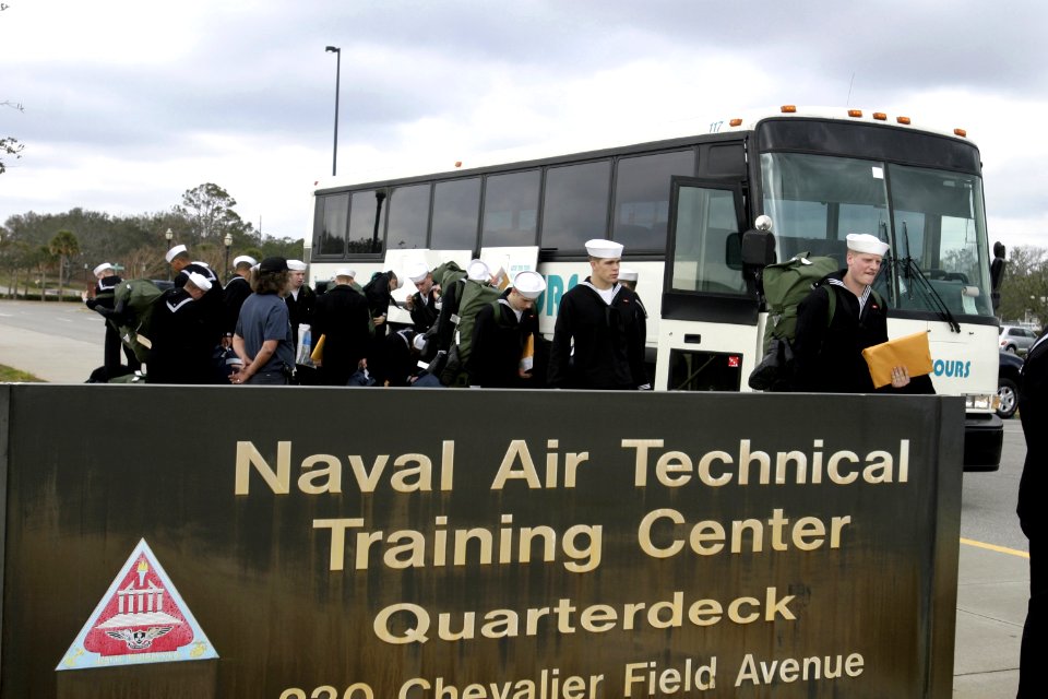US Navy 050126-N-4204E-017 Sailors arrive at Chevalier Hall building on board Naval Air Station Pensacola, Fla., directly from Basic Training at Great Lakes, Ill