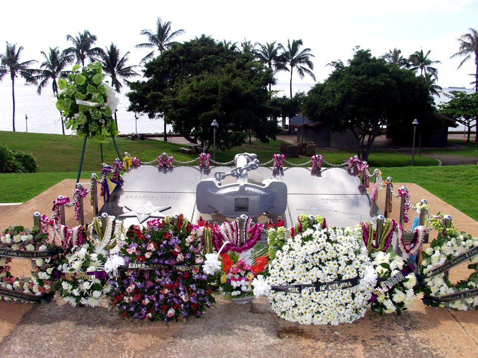 US Navy 050209-N-0879R-001 Flowers adorn the Ehime Maru Memorial in Honolulu, Hawaii, on the fourth anniversary of the collision between the Los Angeles-class attack submarine USS Greeneville (SSN 772)
