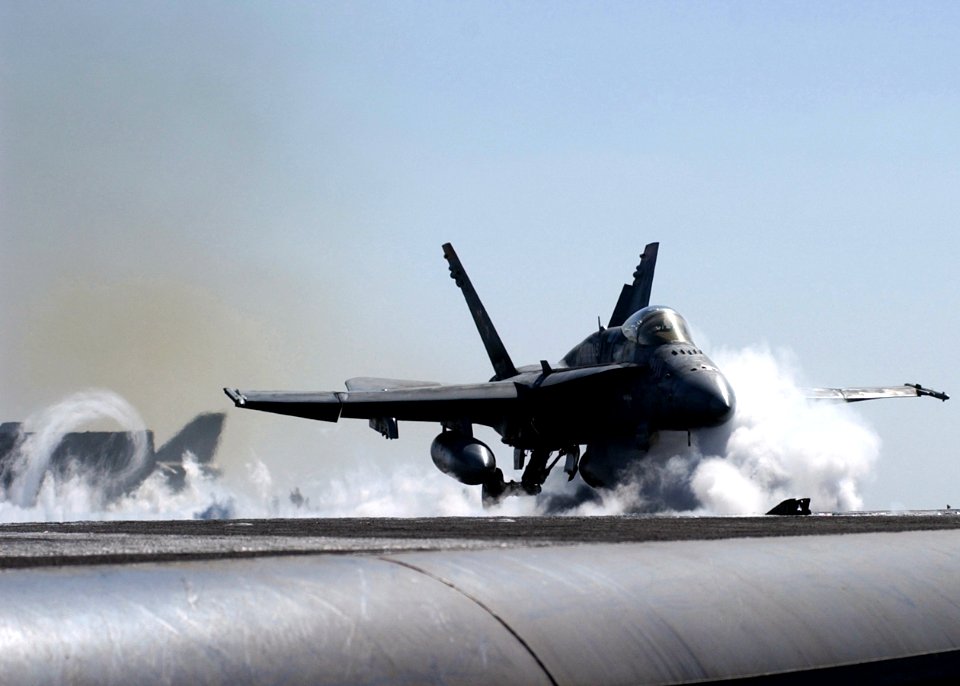 US Navy 050127-N-6363M-021 An F-A-18C Hornet assigned to the Bulls of Strike Fighter Squadron Three Seven (VFA-37) launches off one of the four steam-powered catapults aboard Nimitz-class aircraft carrier USS Harry S. Truman (C