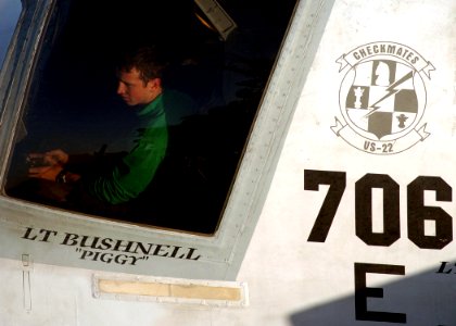 US Navy 050210-N-6363M-001 Aviation Electrician's Mate 3rd Class Jonathan Wilson mans the brake while the S-3B Viking he's in is towed across the flight deck aboard USS Harry S. Truman (CVN 75)