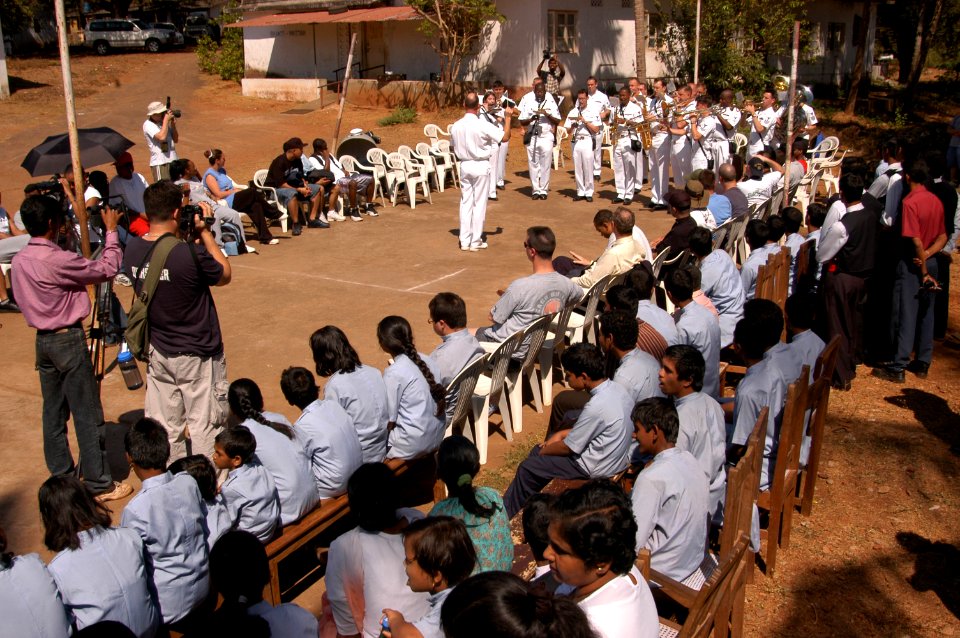 US Navy 050216-N-1194D-001 The Seventh Fleet Band plays for the children of the Saint Francis Xavier Academy for Children with Special Needs in Goa, India, during a community service project