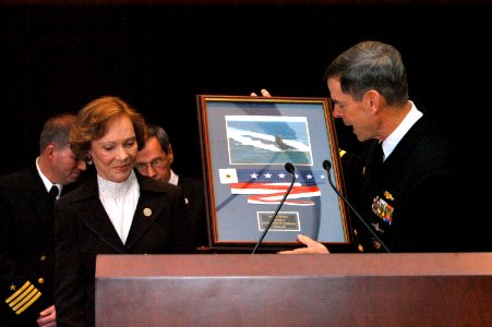 US Navy 050218-N-9543M-011 Vice Adm. Munns presents the USS Jimmy Carter's (SSN 23) commissioning pennant to former first lady Rosalynn Carter
