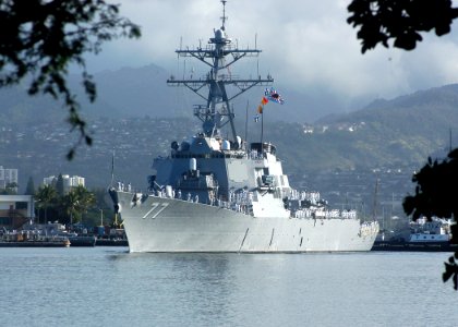 US Navy 050207-N-3019M-005 Sailors man the rails aboard the Arleigh Burke-class guided missile destroyer USS O'Kane (DDG 77) as she leaves Pearl Harbor, Hawaii, for a scheduled deployment