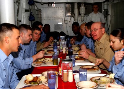 US Navy 050114-N-6363M-078 Chief of Naval Operations, Admiral Vern Clark, enjoys the company of USS Harry S. Truman (CVN 75) crew for lunch on the forward deployed nuclear powered aircraft carrier photo