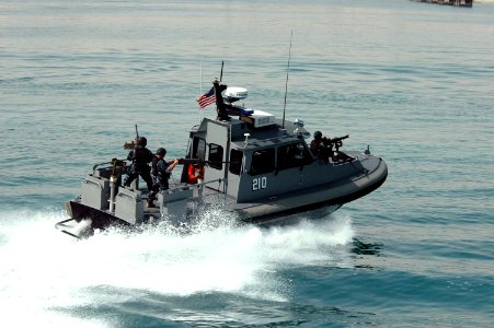 US Navy 050303-N-0000X-003 Sailors assigned to Inshore Boat Unit Two Four (IBU-24) conduct a security patrol in the waters near Kuwait Naval Base