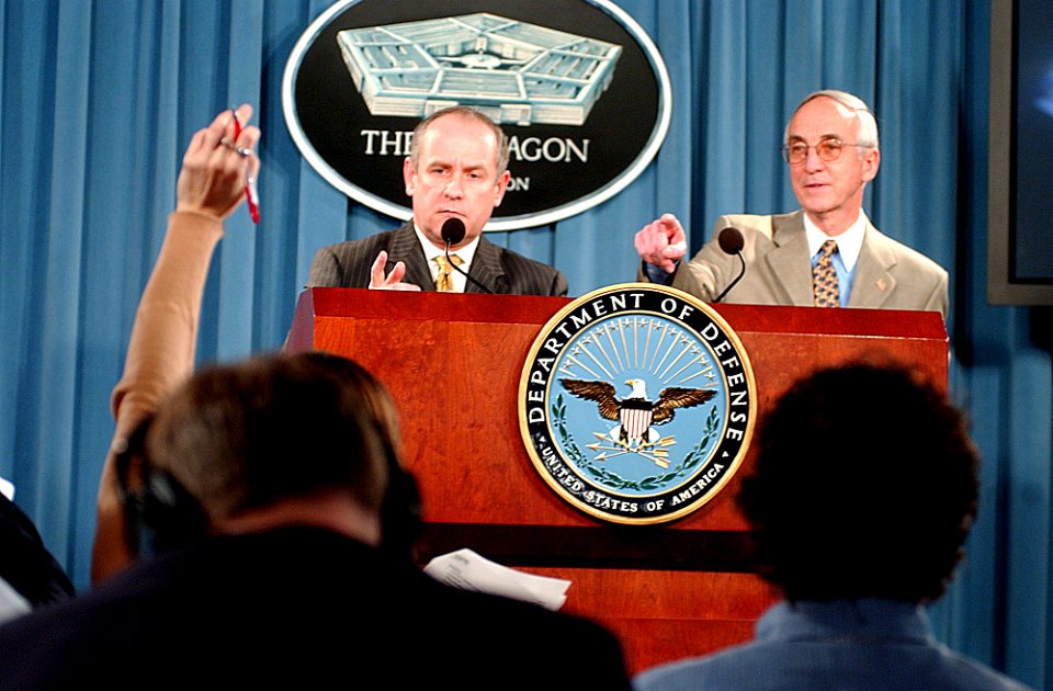 US Navy 050210-N-2568S-002 Secretary of the Navy Gordon England, right, and Acting Director of the Office of Personnel Management Dan Blair, hold a press conference announcing the submission of proposed regulations for the Nati