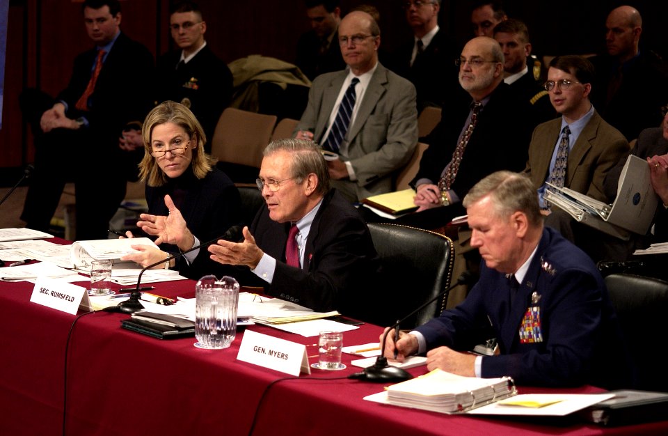 US Navy 050217-F-7203T-209 Secretary of Defense Donald H. Rumsfeld gestures to make a point as he answers a Senator's question during a Senate Armed Services Committee hearing