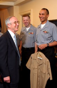 US Navy 050218-N-2568S-002 Secretary of the Navy Gordon England meets with several Task Force Uniform volunteers to find out what they think about the new test uniforms