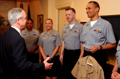 US Navy 050218-N-2568S-001 Secretary of the Navy Gordon England meets with several Task Force Uniform volunteers to find out what they think about the new test uniforms