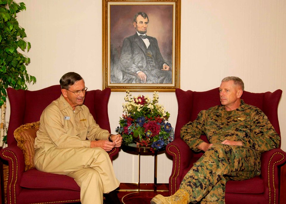 US Navy 050202-N-6074Y-014 Commander Carrier Strike Group Nine (CSG-9) Rear Adm. Crowder and Brig. Gen. Glueck discuss plans relating to the Navy-Marine Corps humanitarian efforts in Banda Aceh, Sumatra, Indonesia