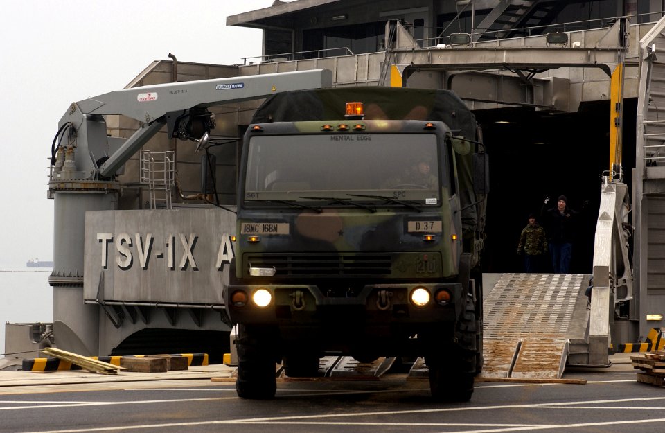 US Navy 050315-F-9629D-079 A U.S. Army Light Medium Tactical Vehicle is loaded onto the U.S. Army's Theater Support Vessel TSV-1X Spearhead at Gwangyang Port Terminal, Republic of Korea