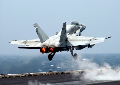 US Navy 050313-N-6363M-007 An F-A-18C Hornet aunches from aboard the Nimitz-class aircraft carrier USS Harry S. Truman (CVN 75)