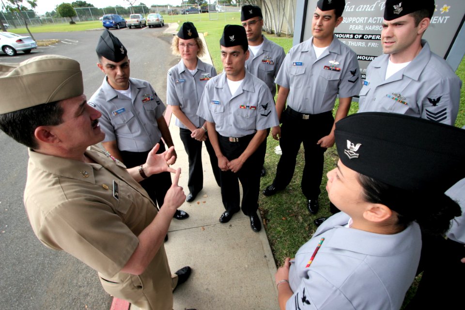 US Navy 050225-N-3228G-006 Master Chief Petty Officer of the Navy (MCPON) Terry Scott speaks to several Task Force Uniform volunteers at the Personnel Support Detachment on board Naval Station Pearl Harbor, Hawaii