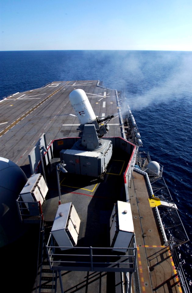 US Navy 050227-N-9866B-002 The amphibious assault ship USS Peleliu (LHA 5) conducts a Close-in Weapons System (CWIS) live fire test during a Pre-Aim Calibration Fire (PACFIRE) in the Pacific Ocean