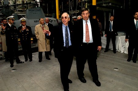 US Navy 050205-N-6477M-210 Secretary of the Navy (SECNAV) Gordon R. England, left, and Rep. Duncan Hunter (R-CA) tour the cargo holding area of the Navy's new experimental Littoral Surface Craft-Experimental (X-Craft), Se