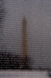 US Navy 050308-N-0295M-012 The Washington Monument is reflected in the black granite wall of the Vietnam Veterans Memorial in Washington, D.C