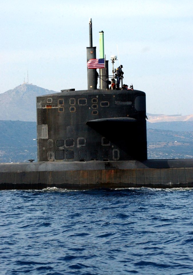 US Navy 050325-N-0780F-078 Crewmembers of Los Angeles-class fast attack submarine USS Albuquerque (SSN 706) mans the flying bridge as they depart Souda harbor